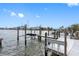 Private dock with boat lift and seating area at 565 115Th Ave, Treasure Island, FL 33706