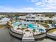 Resort-style pool with expansive deck and lounge chairs at 5672 Bay Tide Ct, Land O Lakes, FL 34638