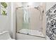 Modern bathroom with a glass shower enclosure and bathtub at 5672 Bay Tide Ct, Land O Lakes, FL 34638