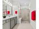 Spa-like bathroom with a walk-in shower and double vanity at 5672 Bay Tide Ct, Land O Lakes, FL 34638