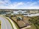 Fenced dog park with shaded areas and agility equipment at 5672 Bay Tide Ct, Land O Lakes, FL 34638