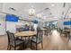 Community room with tables and chairs, offering a bright space at 5672 Bay Tide Ct, Land O Lakes, FL 34638
