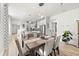 Bright dining room with a wood table and six chairs at 5672 Bay Tide Ct, Land O Lakes, FL 34638