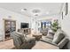 Relaxing living room with comfortable seating and large windows at 5672 Bay Tide Ct, Land O Lakes, FL 34638