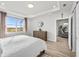 Main bedroom with sitting area and access to bathroom at 5672 Bay Tide Ct, Land O Lakes, FL 34638