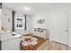 Home office with built-in shelving and wood-look floors at 5672 Bay Tide Ct, Land O Lakes, FL 34638