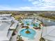 Circular pool and surrounding lounge deck at 5672 Bay Tide Ct, Land O Lakes, FL 34638