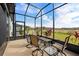 Covered patio with seating area and view of the backyard at 5672 Bay Tide Ct, Land O Lakes, FL 34638