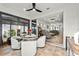Sunroom with view into the living room and backyard at 5672 Bay Tide Ct, Land O Lakes, FL 34638
