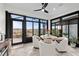 Sunroom with a table and chairs, offering scenic views at 5672 Bay Tide Ct, Land O Lakes, FL 34638