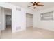 Bedroom with ceiling fan and access to another room at 5912 32Nd N Ave, St Petersburg, FL 33710