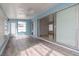 Bright sunroom with light grey wood flooring at 5912 32Nd N Ave, St Petersburg, FL 33710