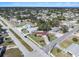 Wide aerial view showing a house's location in a residential neighborhood at 6004 1St W Ave, Bradenton, FL 34209
