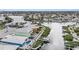 Aerial view of waterfront property with a pool and private boat dock at 6408 Key Island Ave, Apollo Beach, FL 33572