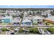 Aerial view showcasing a home with a private pool and dock at 6408 Key Island Ave, Apollo Beach, FL 33572