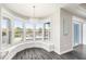Bright breakfast nook with built-in window seating and water views at 6408 Key Island Ave, Apollo Beach, FL 33572
