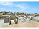 Spacious waterfront deck with firepit and seating area at 6408 Key Island Ave, Apollo Beach, FL 33572