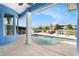 Inviting pool area with plenty of lounge chairs and canal views at 6408 Key Island Ave, Apollo Beach, FL 33572