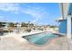 Inviting kidney-shaped pool with lounge chairs at 6408 Key Island Ave, Apollo Beach, FL 33572