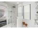 Walk-in shower with marble tile and glass enclosure at 6408 Key Island Ave, Apollo Beach, FL 33572