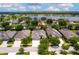 Aerial view of a house and surrounding neighborhood near lake at 6429 Seasound Dr, Apollo Beach, FL 33572