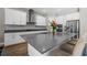 Modern kitchen with island, stainless steel appliances at 6429 Seasound Dr, Apollo Beach, FL 33572