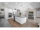 Bright kitchen with stainless steel appliances and an open floor plan at 6429 Seasound Dr, Apollo Beach, FL 33572