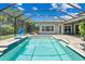 Inviting, refreshing pool with a waterfall feature at 6429 Seasound Dr, Apollo Beach, FL 33572