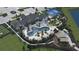 Community amenities including pool, clubhouse, playground, and garden at 6690 Michael Favor Way, Wesley Chapel, FL 33545