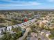 Aerial view of home near golf course and lake at 7710 Palm Aire Ln, Sarasota, FL 34243