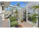 Screened patio provides a private outdoor space at 7710 Palm Aire Ln, Sarasota, FL 34243