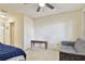 Simple bedroom with a double bed, sofa and small table at 10265 Gandy N Blvd # 1715, St Petersburg, FL 33702