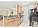 Modern kitchen with granite countertops and stainless steel appliances at 10265 Gandy N Blvd # 1715, St Petersburg, FL 33702
