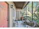 Inviting screened porch with seating, perfect for relaxing outdoors at 10265 Gandy N Blvd # 1715, St Petersburg, FL 33702