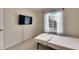 Small bedroom with window and a bed at 10817 Keys Gate Dr, Riverview, FL 33579