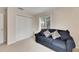 Bedroom with sofa and closet at 10817 Keys Gate Dr, Riverview, FL 33579
