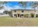 Front view of a two-story townhome with a well-maintained lawn at 10817 Keys Gate Dr, Riverview, FL 33579