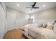 Serene bedroom featuring a comfortable bed and built-in shelving at 11911 Mandevilla Ct, Tampa, FL 33626