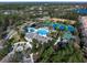 Aerial view of community amenities including pool and courts at 11911 Mandevilla Ct, Tampa, FL 33626