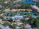 Resort-style pool, tennis courts, and other amenities at 11911 Mandevilla Ct, Tampa, FL 33626