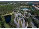 Gated community entrance with clubhouse and lush landscaping at 11911 Mandevilla Ct, Tampa, FL 33626