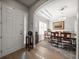 Elegant dining room with hardwood floors, a large table, and chandelier at 11911 Mandevilla Ct, Tampa, FL 33626