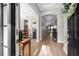 Bright and spacious entryway with hardwood floors, leading to other rooms at 11911 Mandevilla Ct, Tampa, FL 33626