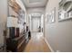Bright hallway with hardwood floors and decor at 11911 Mandevilla Ct, Tampa, FL 33626