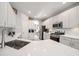 Modern kitchen with stainless steel appliances and large island at 11911 Mandevilla Ct, Tampa, FL 33626