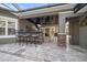 Brick outdoor bar with seating, perfect for entertaining at 11911 Mandevilla Ct, Tampa, FL 33626