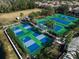 Aerial view of community pickleball and tennis courts at 11911 Mandevilla Ct, Tampa, FL 33626