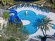 Aerial view of community leisure pool with waterslide at 11911 Mandevilla Ct, Tampa, FL 33626