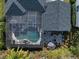 Aerial view of a refreshing pool with a screened enclosure at 11911 Mandevilla Ct, Tampa, FL 33626