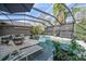 Enjoy this relaxing pool area with a covered patio at 11911 Mandevilla Ct, Tampa, FL 33626